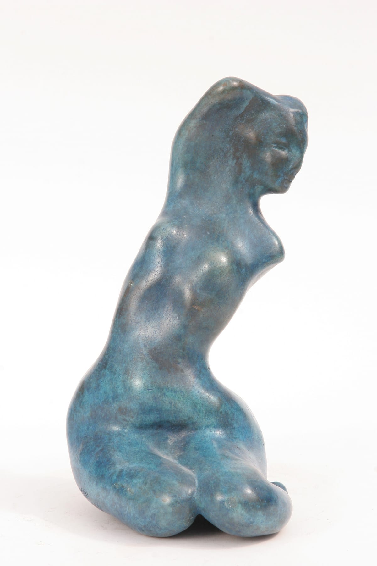 Sculpture en bronze, Femme se coiffant